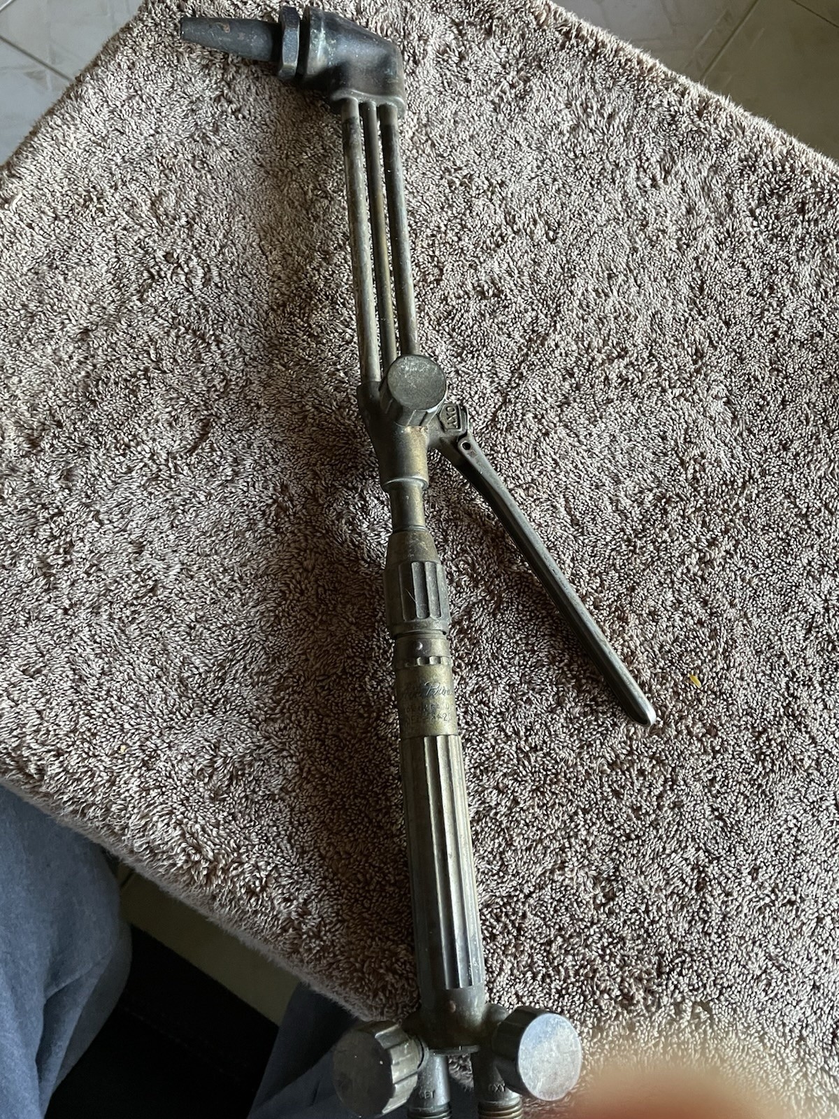 A pair Of Cutting Torch Air Product And A Ox Weld