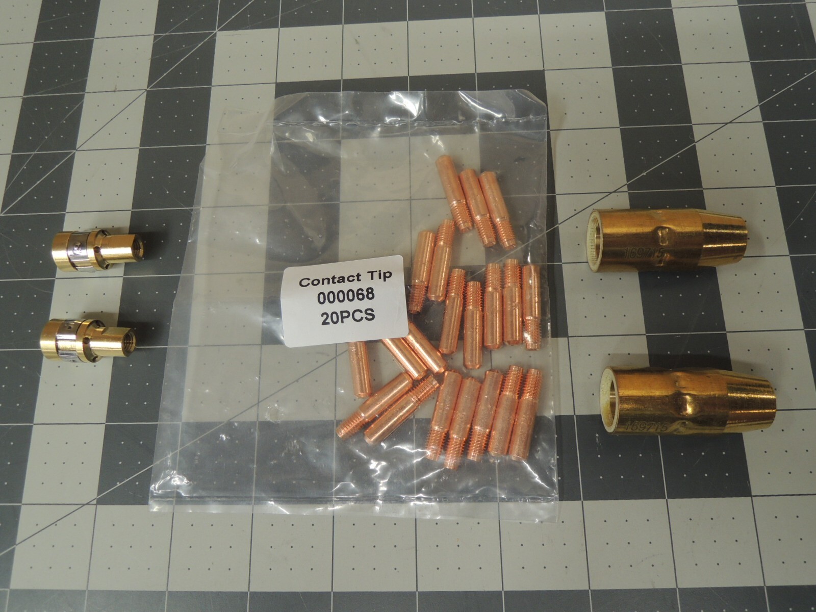 Miller 000068 Contact Tips (20), 169715 Nozzles (2), and Mig Adapters (2)
