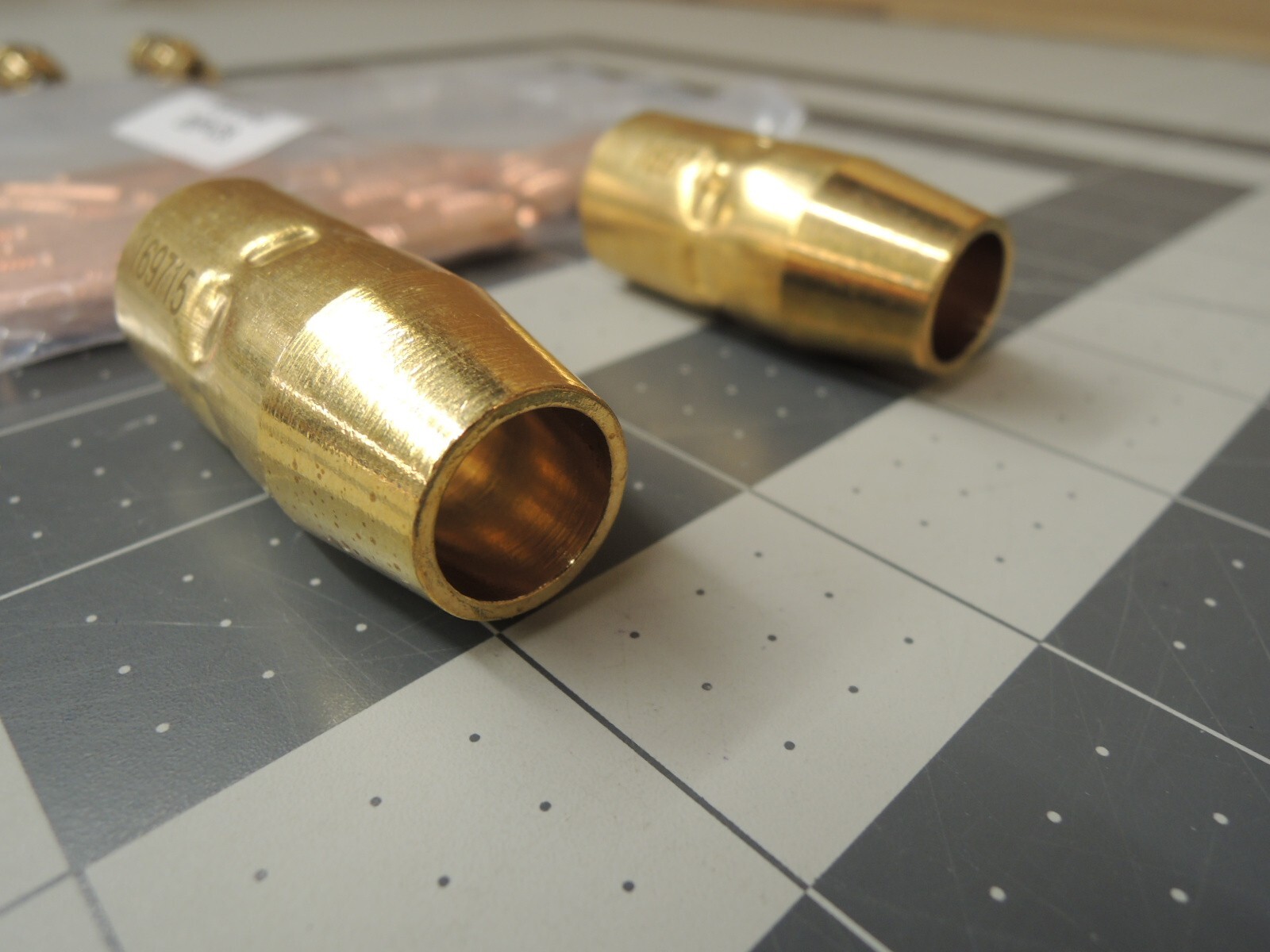 Miller 000068 Contact Tips (20), 169715 Nozzles (2), and Mig Adapters (2)